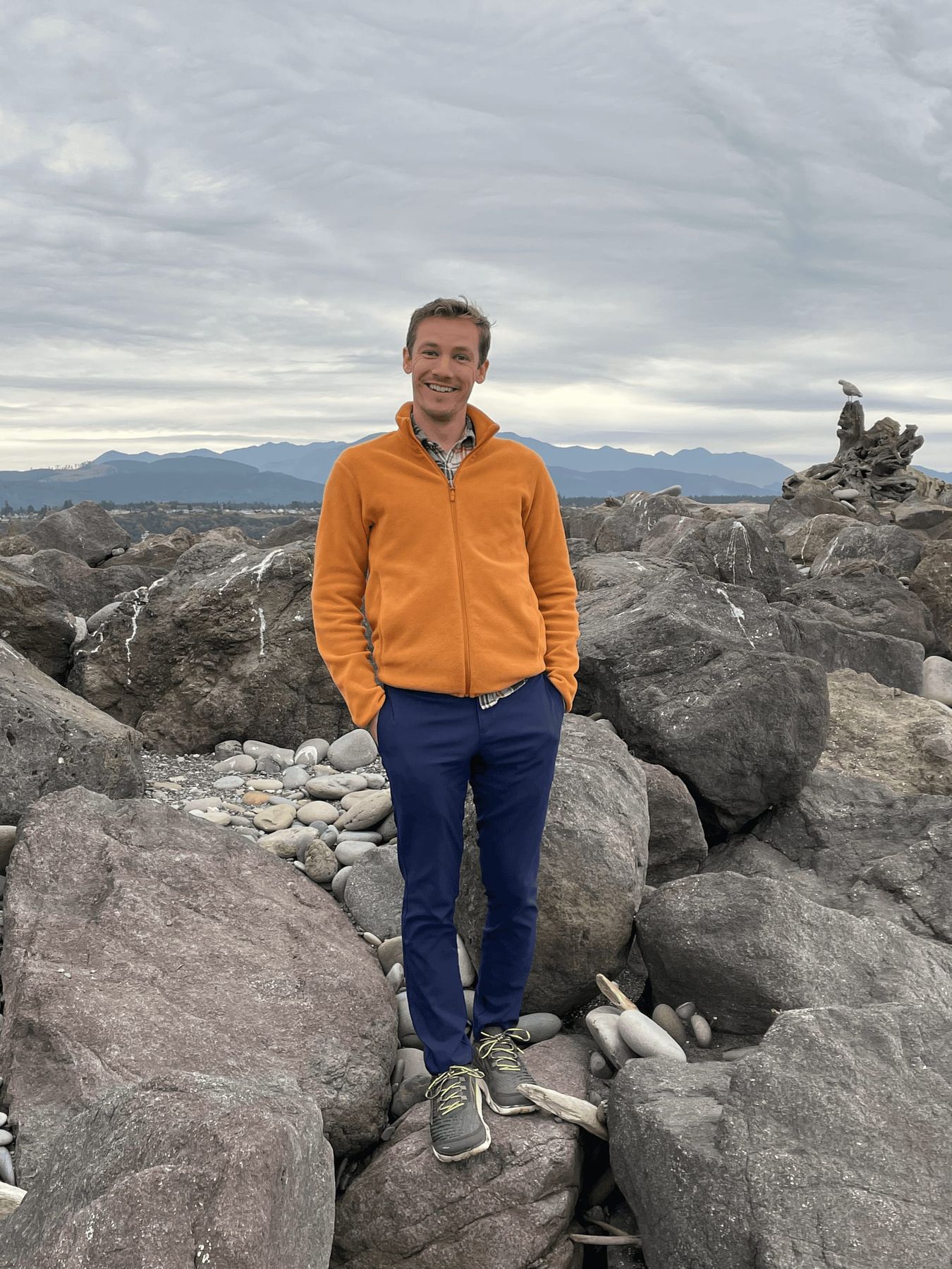 Nate Bauer standing near the beach