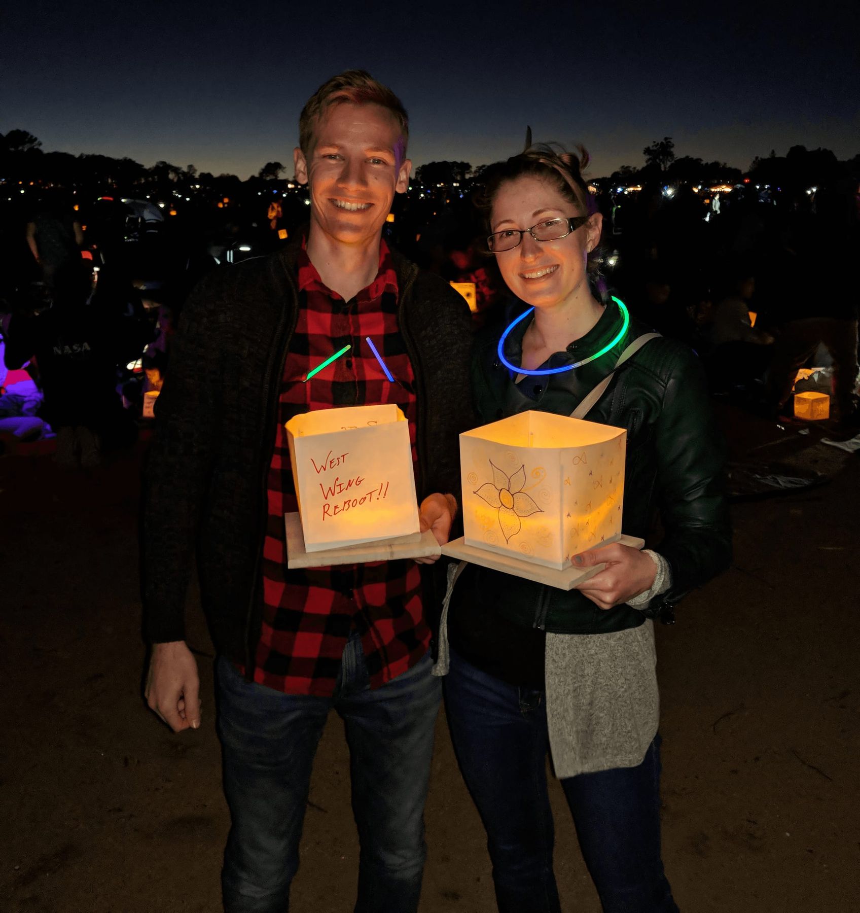 Nate Bauer and his wife holding home made paper lanterns