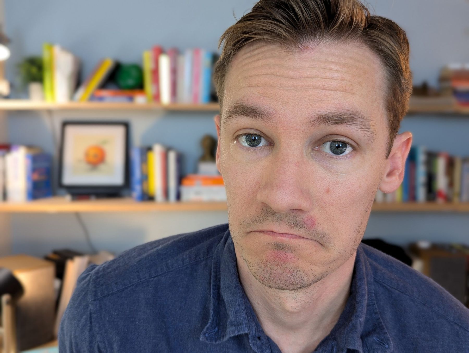 Nate Bauer making a silly face at his desk